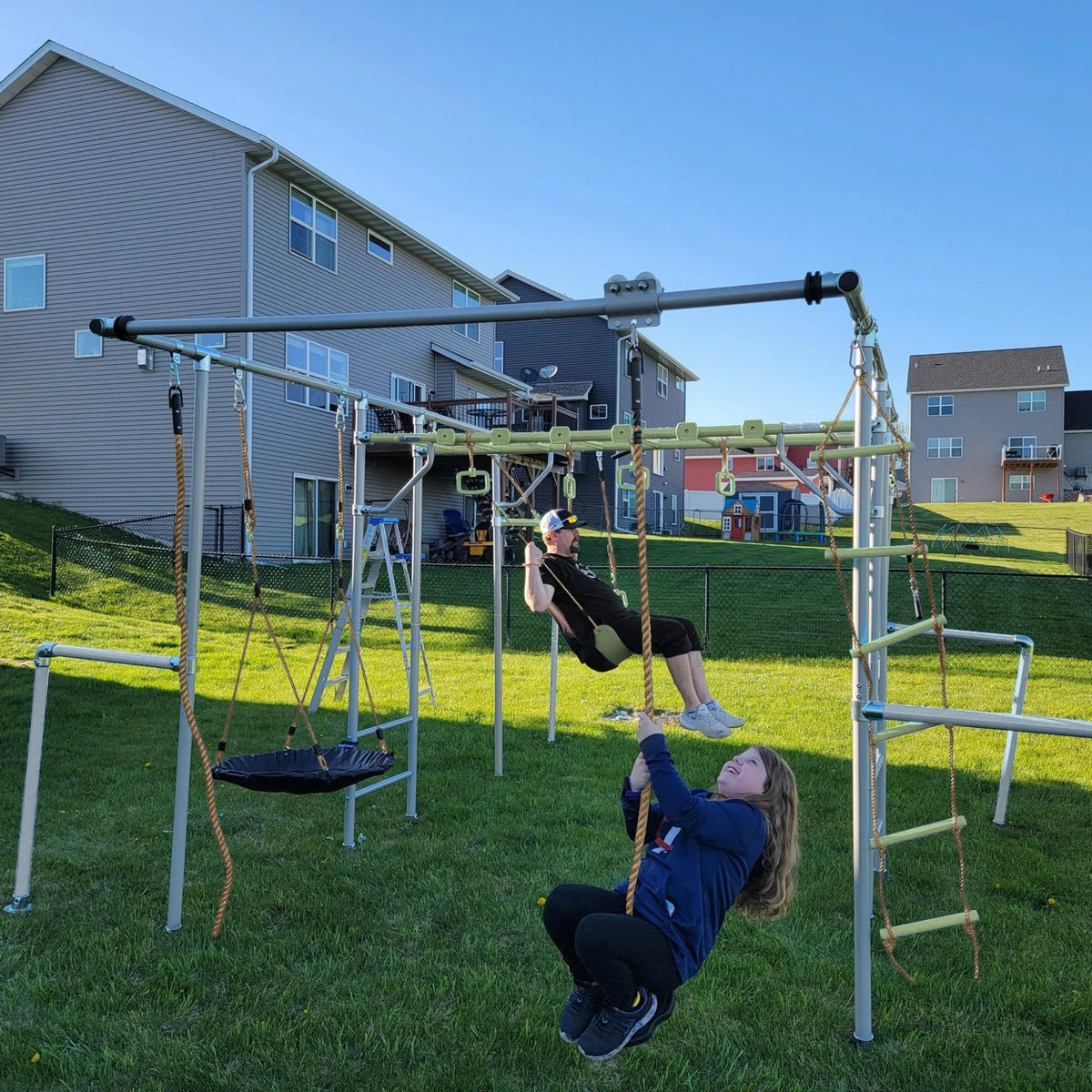 Flying Fox (Zip Line) in use on a Growplay frame in a family garden