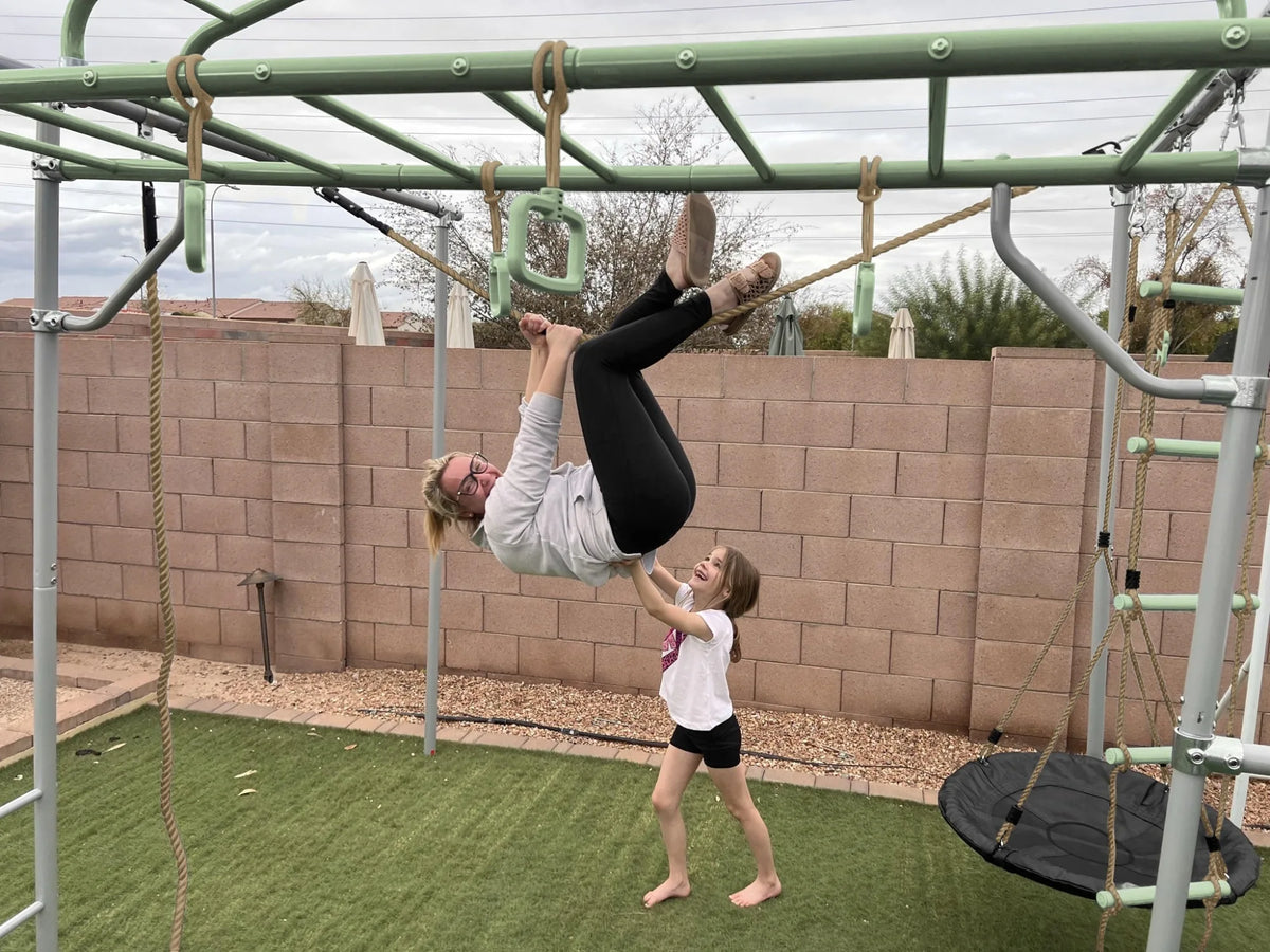 Traverse Rope in use on a Growplay frame in a family garden