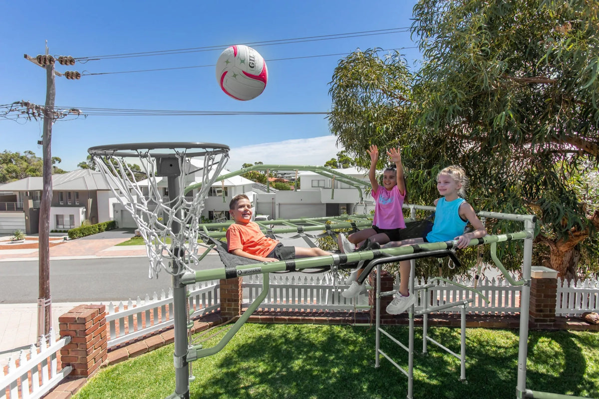 Netball Ring in use on a Growplay frame in a family garden