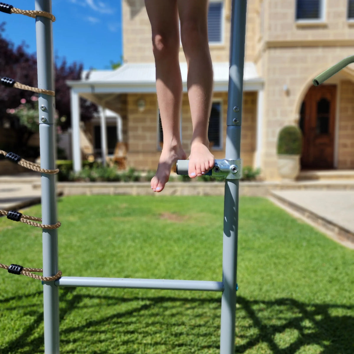 Adjustable Steps in use on a Growplay frame in a family garden