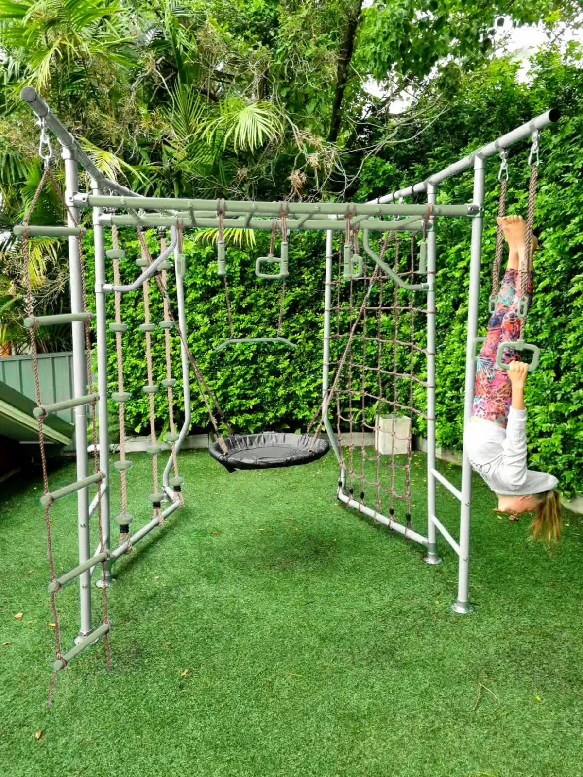 Gym Rings in use on a Growplay frame in a family garden
