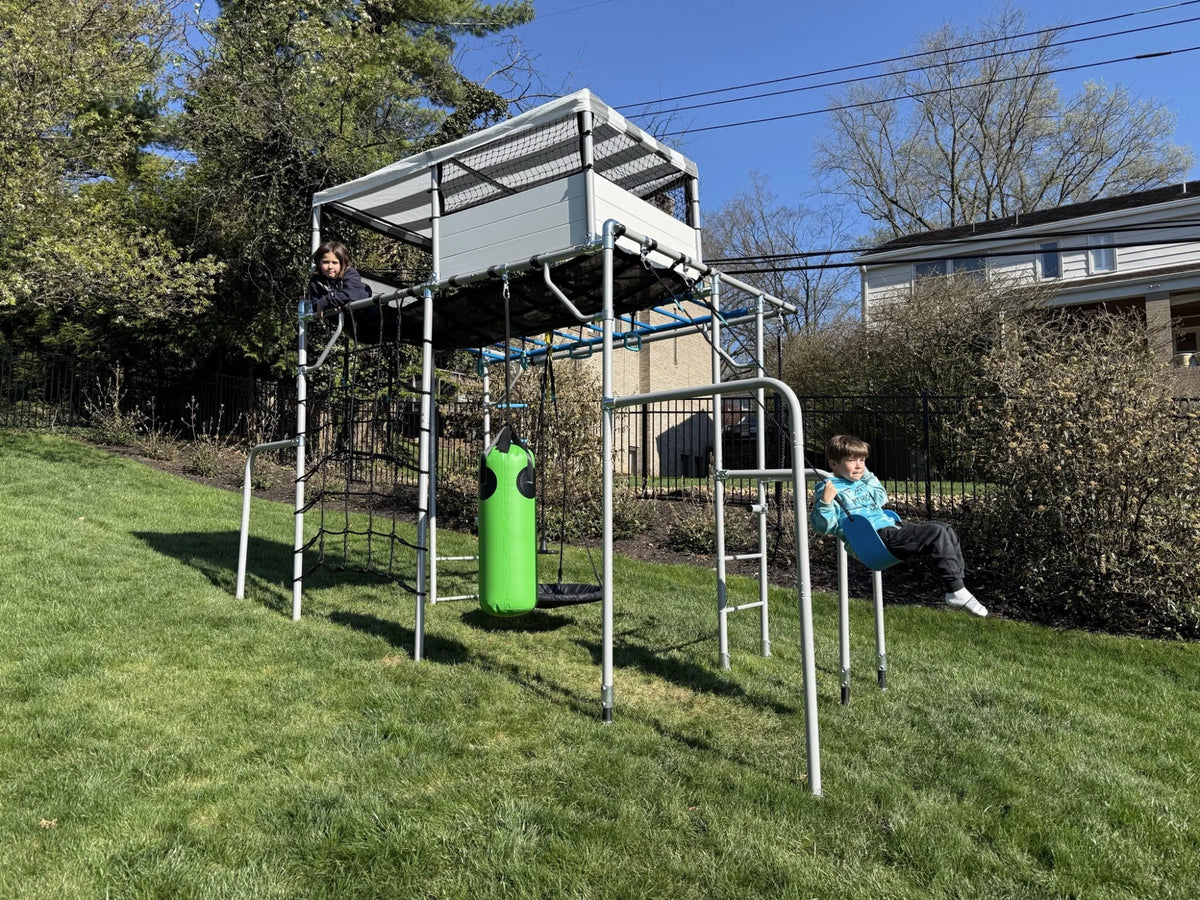 Levelling Kit (Sloped Gardens) in use on a Growplay frame in a family garden