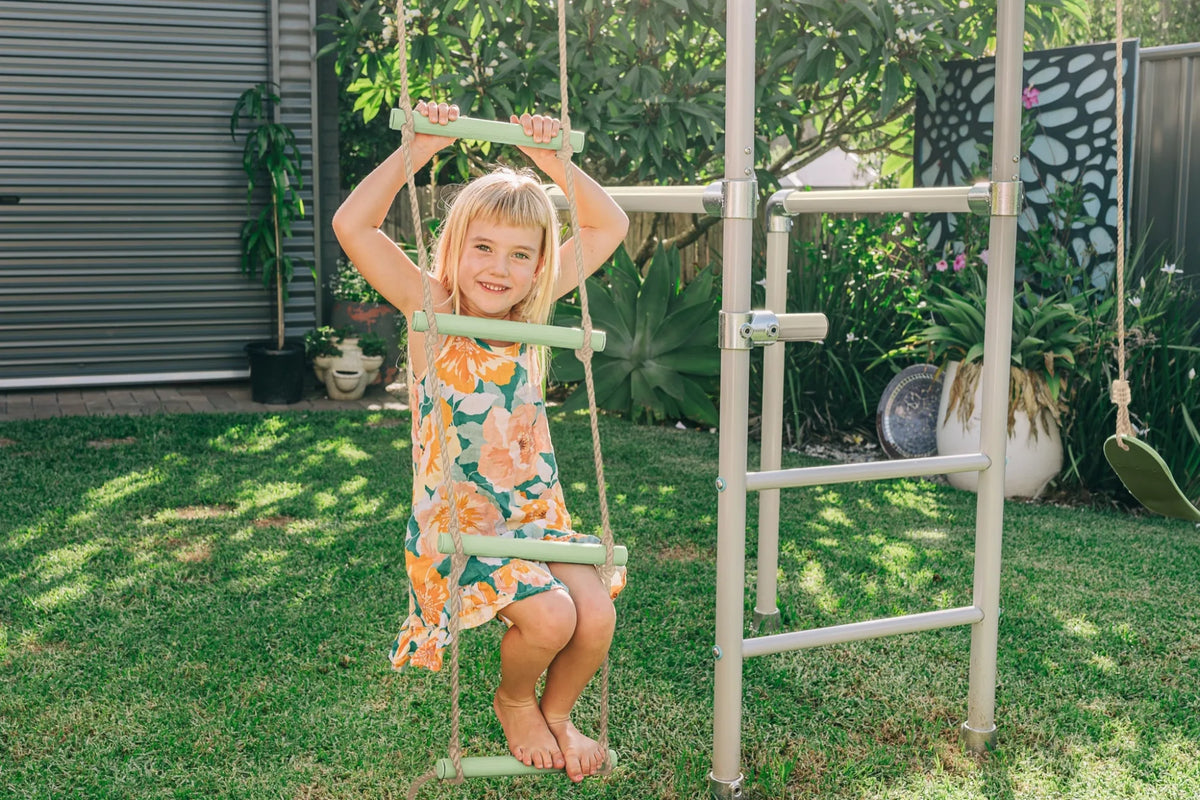 Rope Ladder in use on a Growplay frame in a family garden